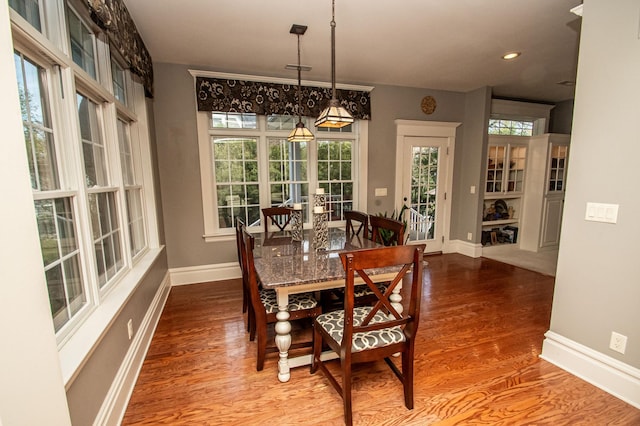 dining area featuring hardwood / wood-style flooring