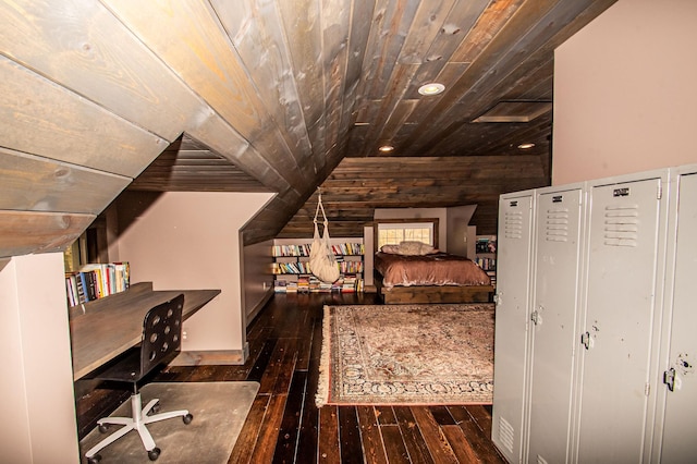 bedroom featuring dark wood-type flooring, wooden walls, and wooden ceiling