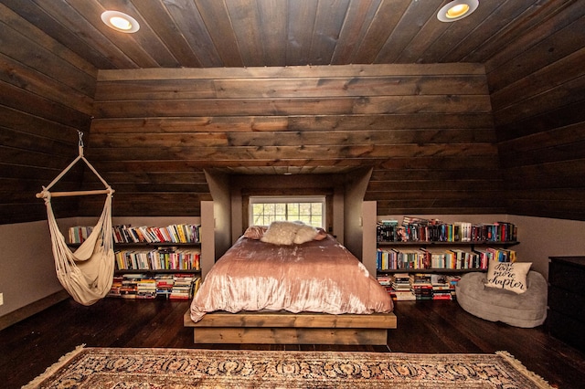 bedroom featuring wooden walls, wooden ceiling, and dark hardwood / wood-style flooring