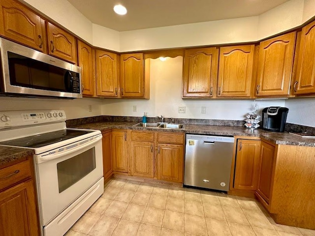 kitchen featuring appliances with stainless steel finishes and sink