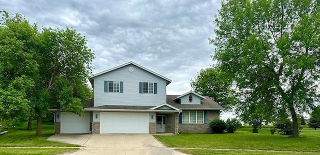 view of front of house with a front yard and a garage