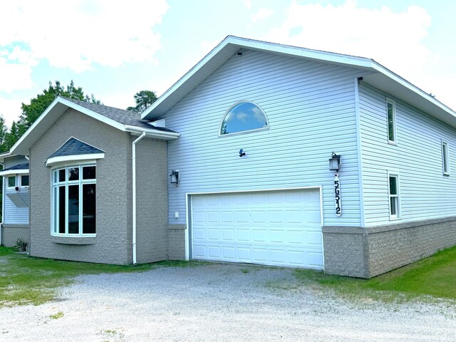 view of home's exterior with a garage