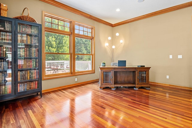 office featuring crown molding and light hardwood / wood-style floors