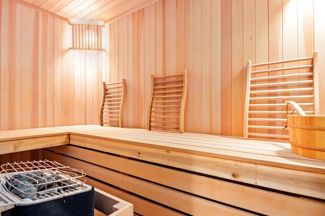 view of sauna with wooden ceiling