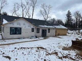 view of snow covered property