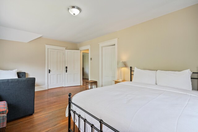 2799 27th St Unit 14, Gardeners, Birchwood, WI 54817 - bedroom featuring hardwood / wood-style floors