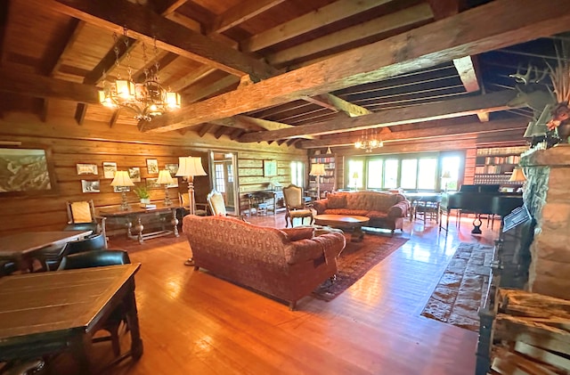 2799 27th St Unit 8, Katherine, Birchwood, WI 54817 - living area featuring wooden walls, a chandelier, and wood finished floors
