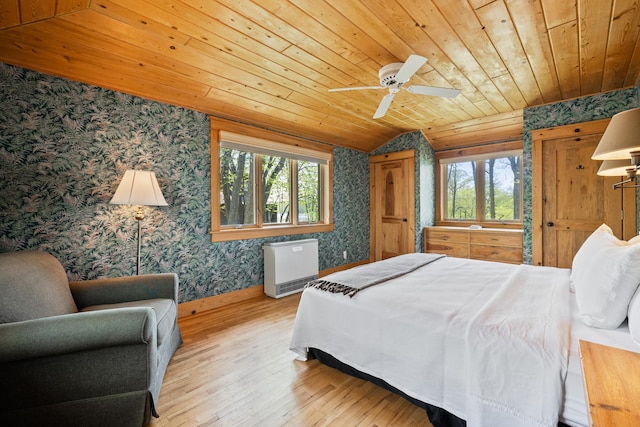 2799 27th St Unit 8, Katherine, Birchwood, WI 54817 - bedroom with wallpapered walls, wood ceiling, multiple windows, wood-type flooring, and baseboards