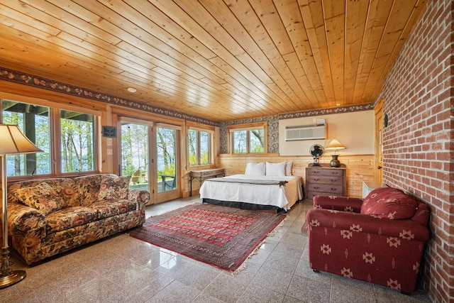 2799 27th St Unit 8, Katherine, Birchwood, WI 54817 - bedroom featuring access to outside, a wainscoted wall, granite floors, multiple windows, and wood ceiling