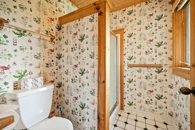2799 27th St Unit 8, Katherine, Birchwood, WI 54817 - full bathroom with wallpapered walls, a shower stall, toilet, baseboards, and tile patterned flooring