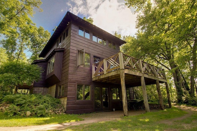 2799 27th St Unit 8, Katherine, Birchwood, WI 54817 - rear view of property featuring a wooden deck