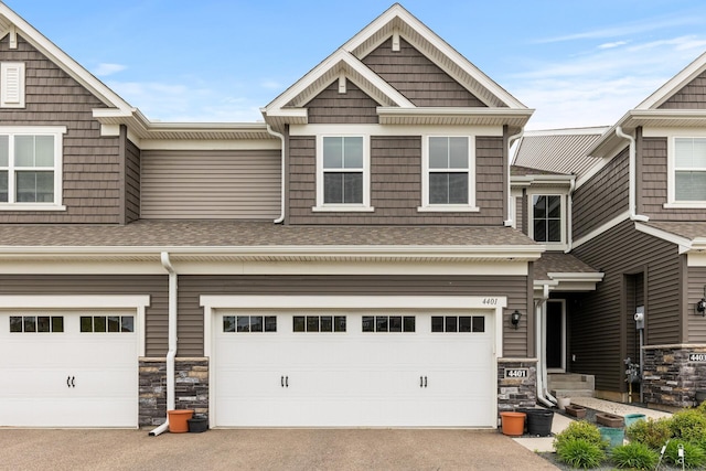 view of front of property featuring a garage