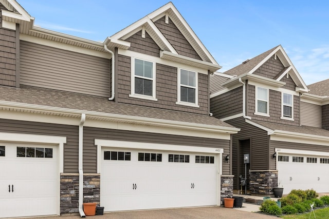 craftsman house featuring a garage