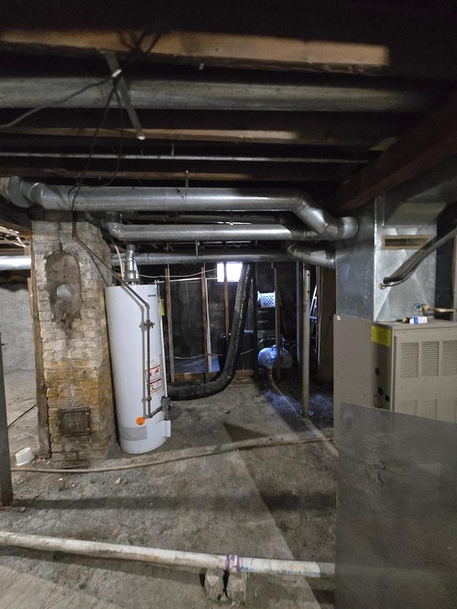 basement featuring gas water heater