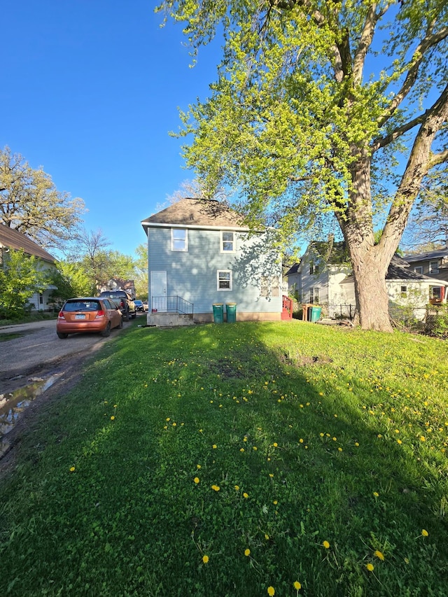 exterior space featuring a front lawn