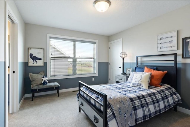 bedroom featuring carpet