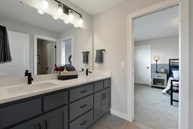 bathroom featuring tile patterned floors and vanity