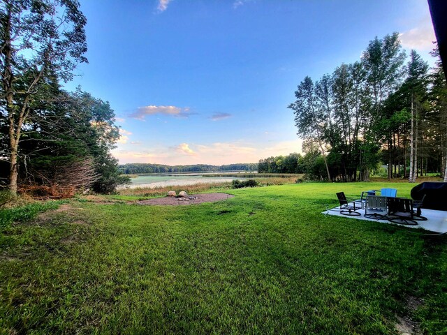 view of yard with a patio and a rural view