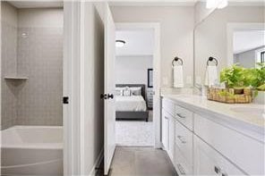 bathroom featuring vanity and tile floors