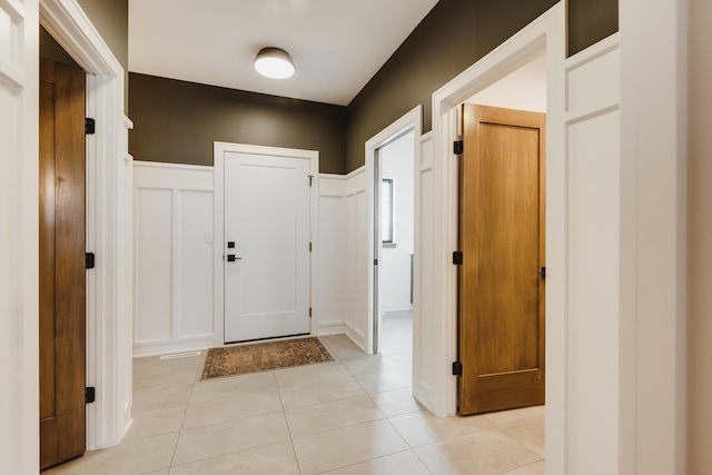 interior space with light tile patterned floors