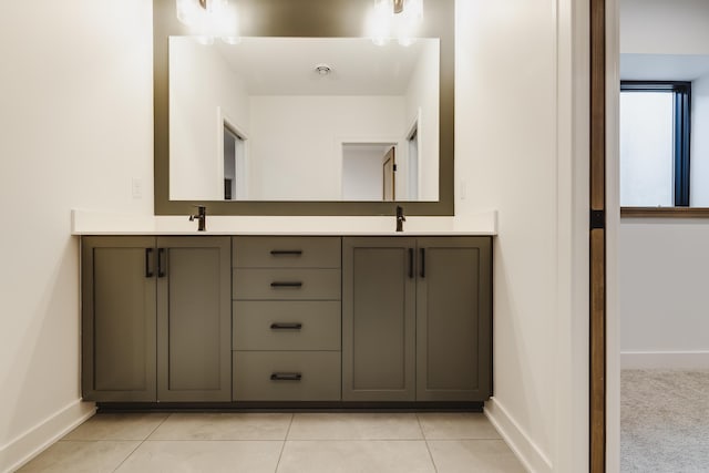 bathroom featuring tile patterned floors and vanity