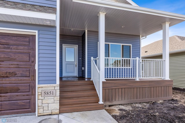 entrance to property with covered porch