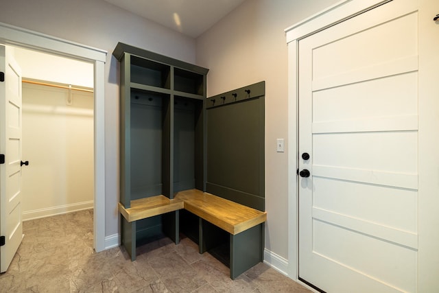 mudroom featuring baseboards