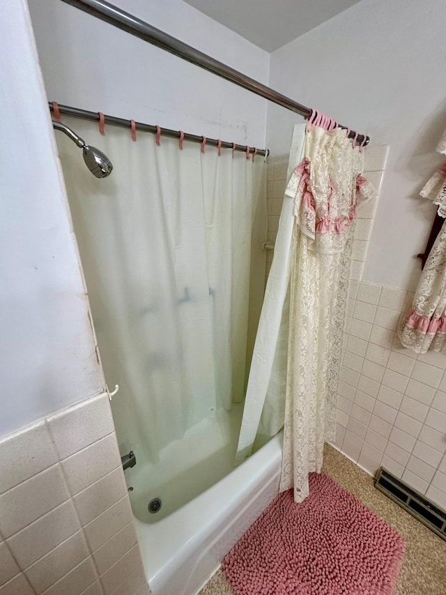 bathroom featuring shower / bath combo