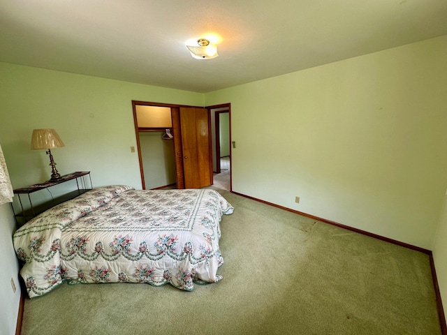 carpeted bedroom featuring a closet