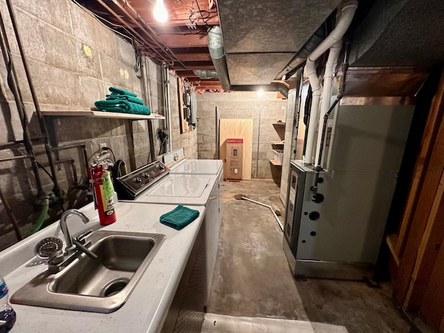 interior space featuring washer and dryer and sink