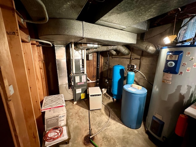 utility room with heating utilities and electric water heater