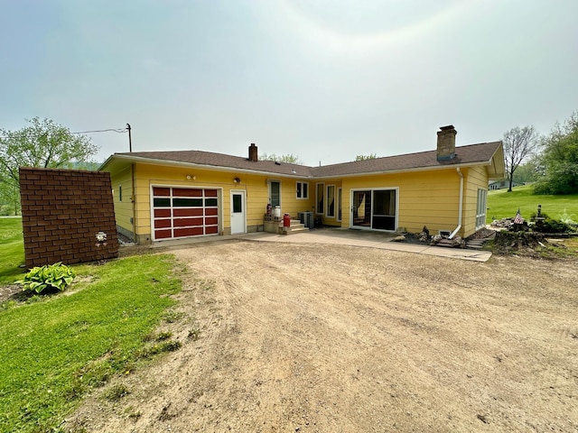 rear view of house with a patio area