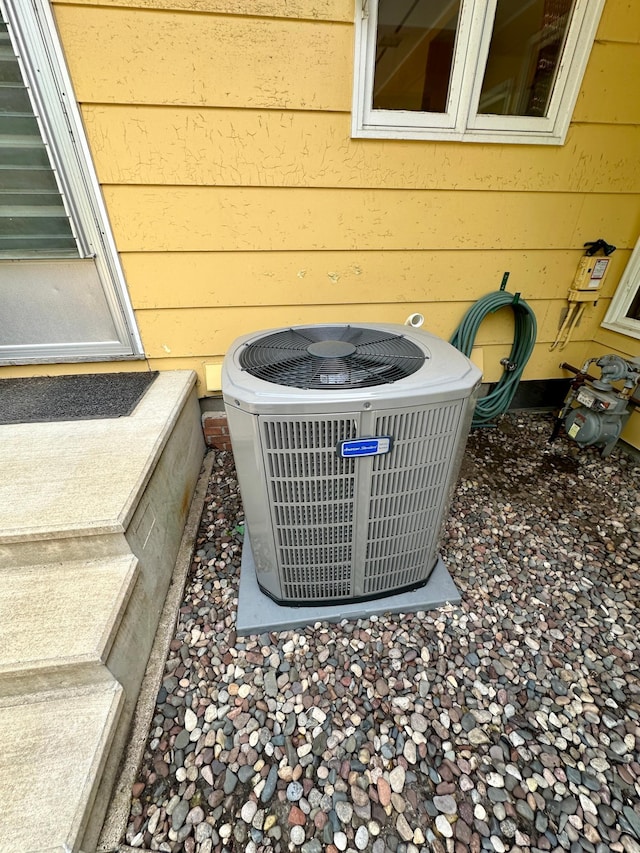 details with central AC and wooden walls