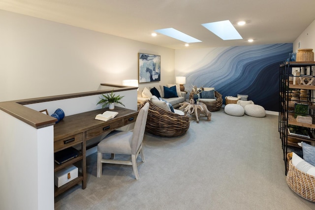 carpeted office with a skylight