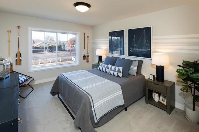 bedroom featuring light colored carpet