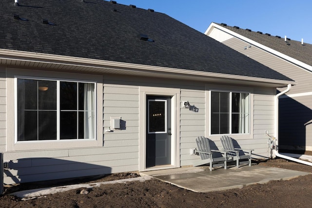 rear view of property featuring a patio