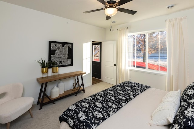 bedroom featuring carpet and ceiling fan