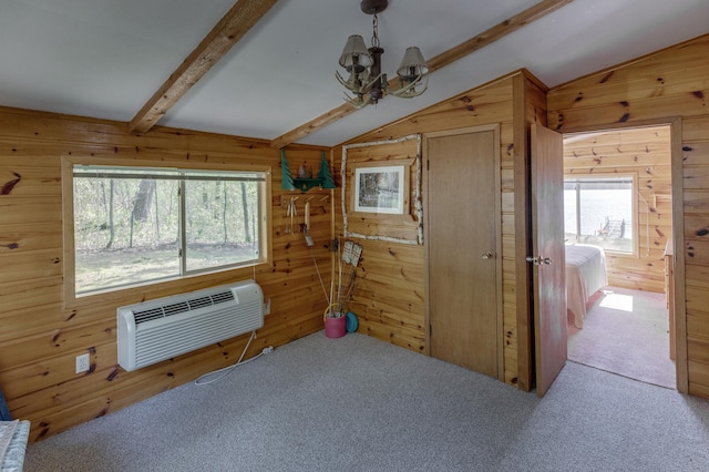 carpeted bedroom featuring lofted ceiling with beams, multiple windows, wooden walls, and a notable chandelier