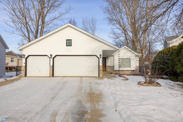 view of front of home with a garage