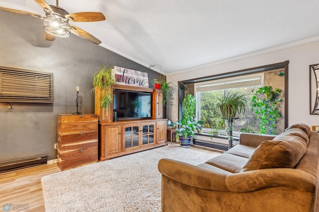 living room with vaulted ceiling, ceiling fan, crown molding, a baseboard radiator, and hardwood / wood-style flooring