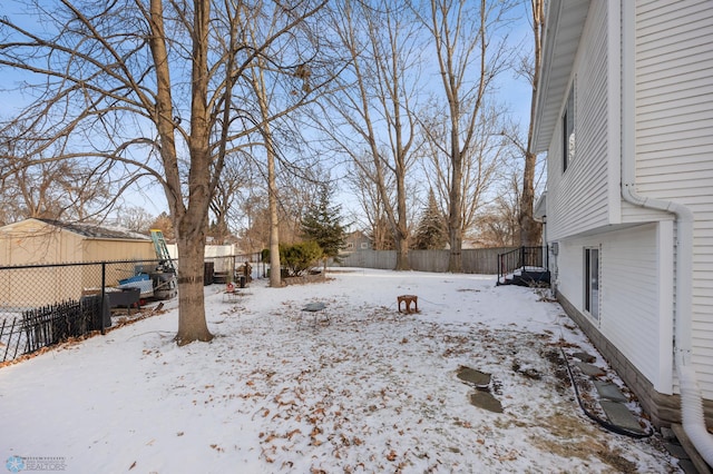 view of yard covered in snow