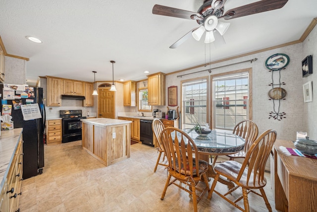 tiled dining room with plenty of natural light, ceiling fan, crown molding, and sink