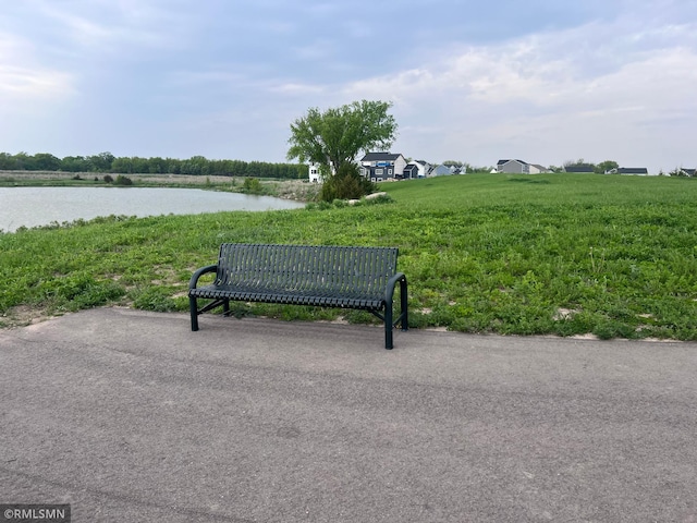 view of home's community with a water view