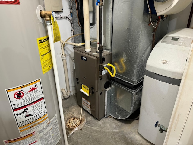 utility room featuring gas water heater