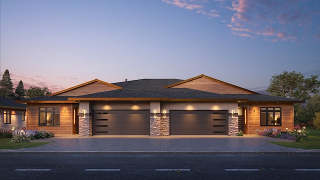 view of front of home with a garage