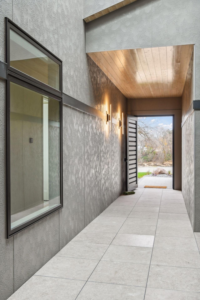 corridor with wood ceiling