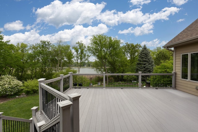 deck featuring a water view