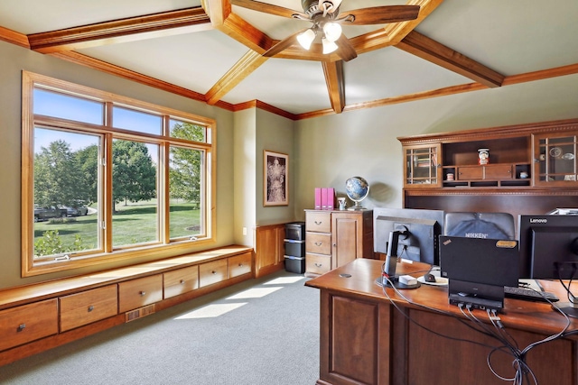 office space featuring beamed ceiling, ceiling fan, ornamental molding, and light carpet