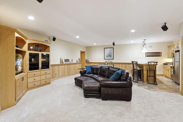 living room featuring light colored carpet