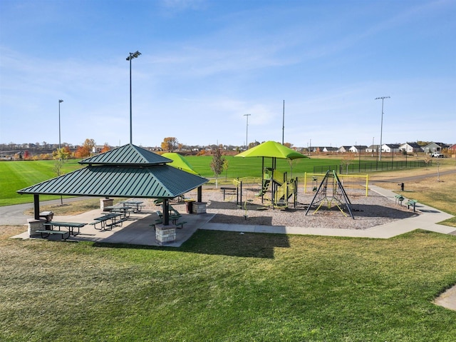 view of play area featuring a gazebo and a lawn